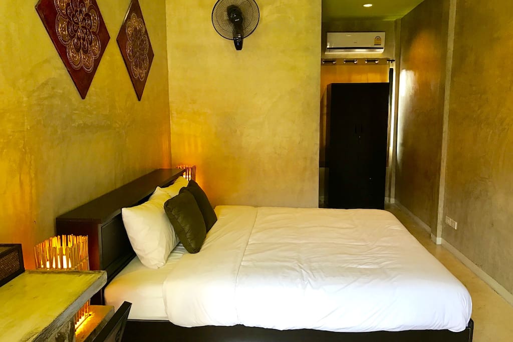 King-sized bed with lots of space.