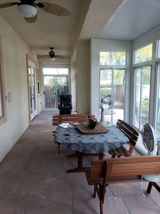 back yard sunroom with massage chair