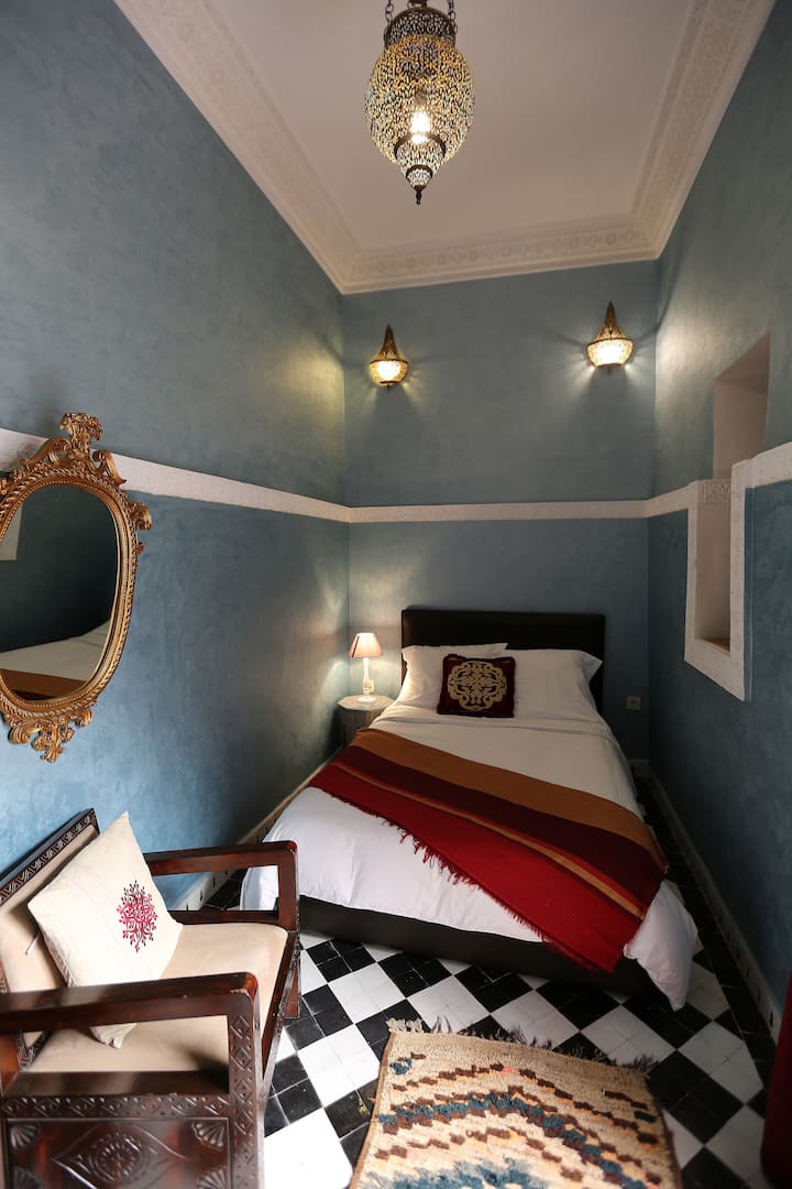 The Acaica room (the blue room) is on the first floor next to the pool.