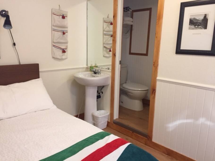 Small but private bathroom with stand-up shower