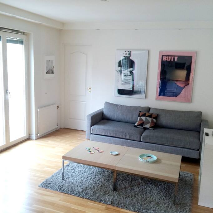 living room with the door going to the guest room