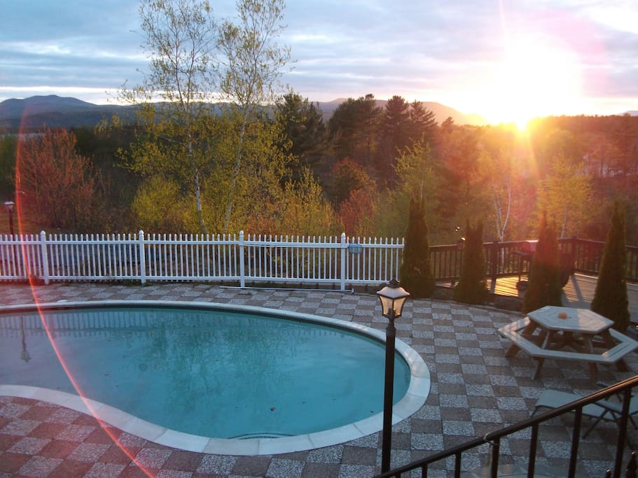 in ground kidney shaped pool overlooking views;sunsets