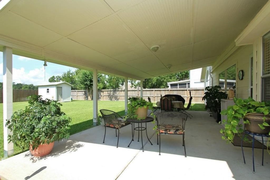Nice covered patio where you can sit back and relax with a cup of coffee enjoying the view and the breeze.