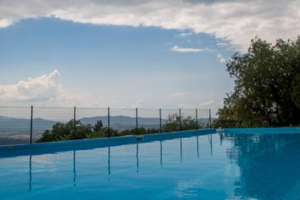 Outdoor pool shared with other cool guests.
