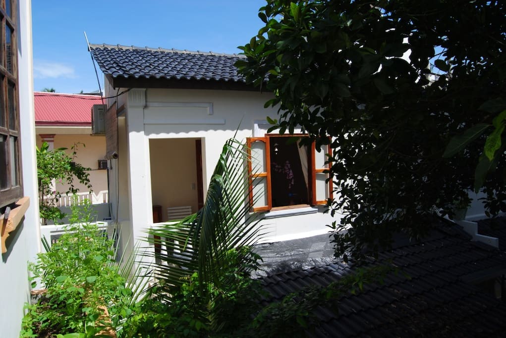 Get up with bird-singing sound, sunlight in a beautiful tropical garden of a Nha Trang local family