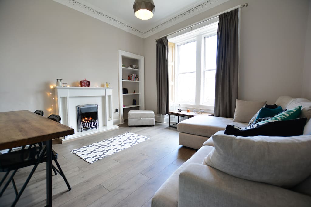 Dining table in living room with 4 chairs