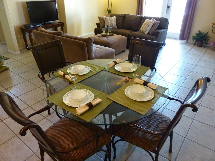 4-person dining table. Complimentary Wi-Fi is provided throughout the condo.