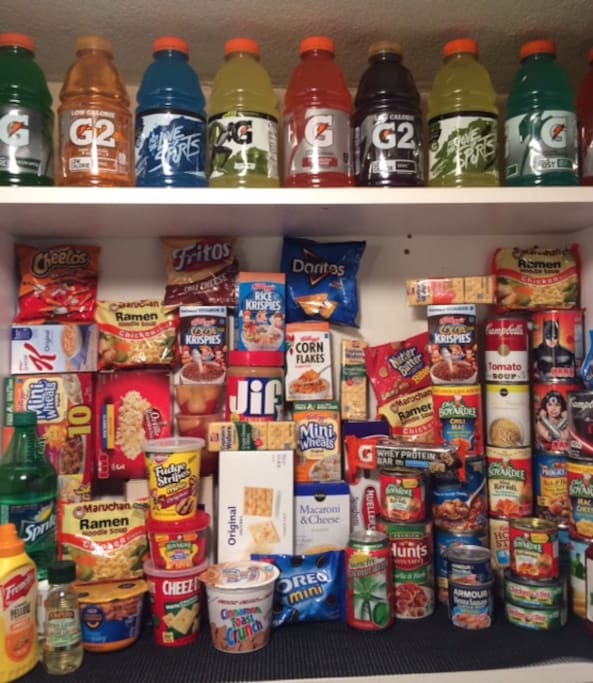 This is typically what this cupboard over the stove looks like. There are a couple of drawers that look similar as well as the refrigerator. I don't include these treasures in the price of the room, so your nominal donation for items used is shamelessly appreciated and will help keep this cupboard colorful for future guests. :)