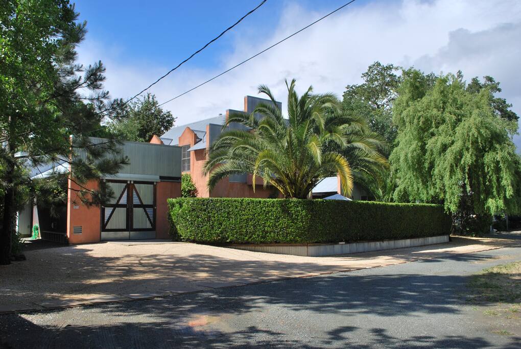Main house flanked by garage and cottage