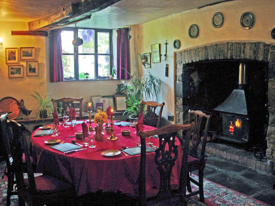 Breakfast in the medieval dining room next to the crackling log fire