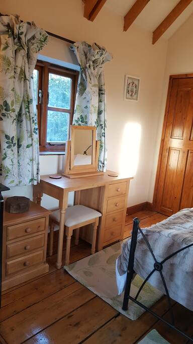 Use the dressing table which looks out to the courtyard garden as you are drying your hair with the hairdryer which is provided.