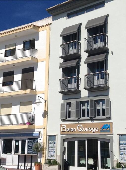 Fully renovated facade with French-styled windows - duplex is on 3rd and 4th floor