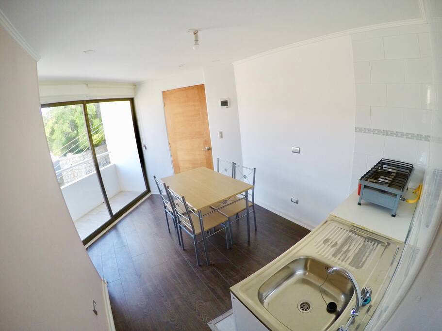 Cocina comedor + terraza con hermosa vista