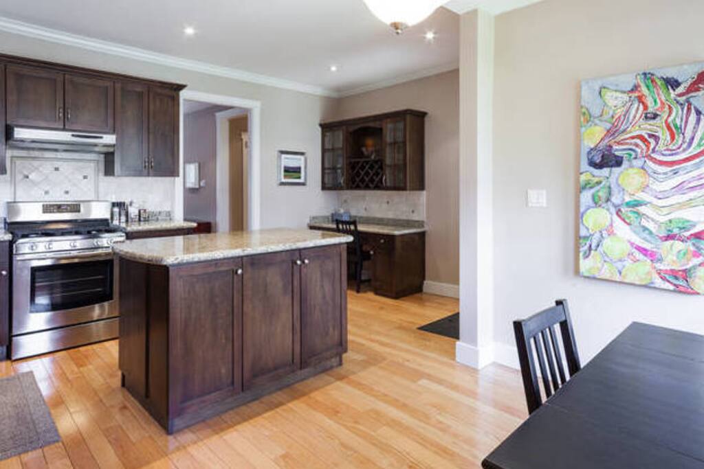 Kitchen has all pots, pans, dishes, utensils.