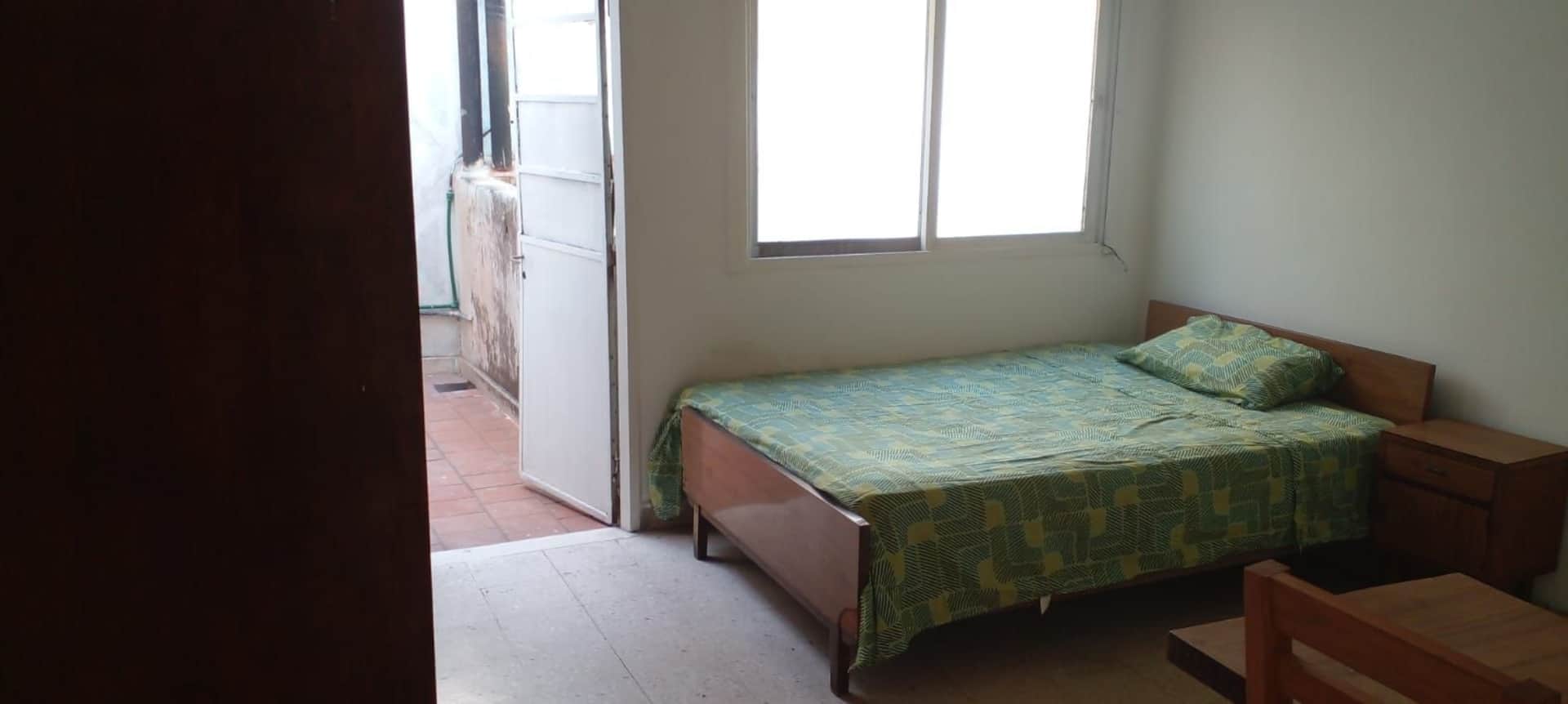 Quarto em apartamento no estilo residential hotel em Colegiales