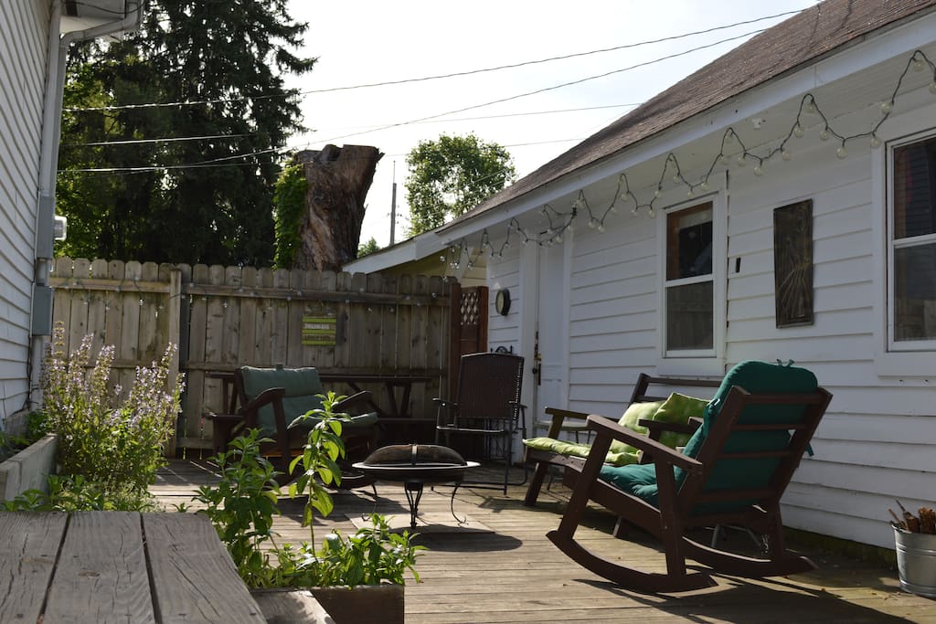 Back yard patio with separate entrance into back suite.