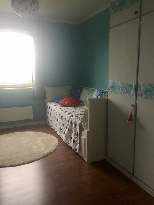 Bedroom 4, (picture 1): bedroom with a 80cm bed with a bed base that can be pulled out to a double bed, desk, chairs, shelves and a wardrobe