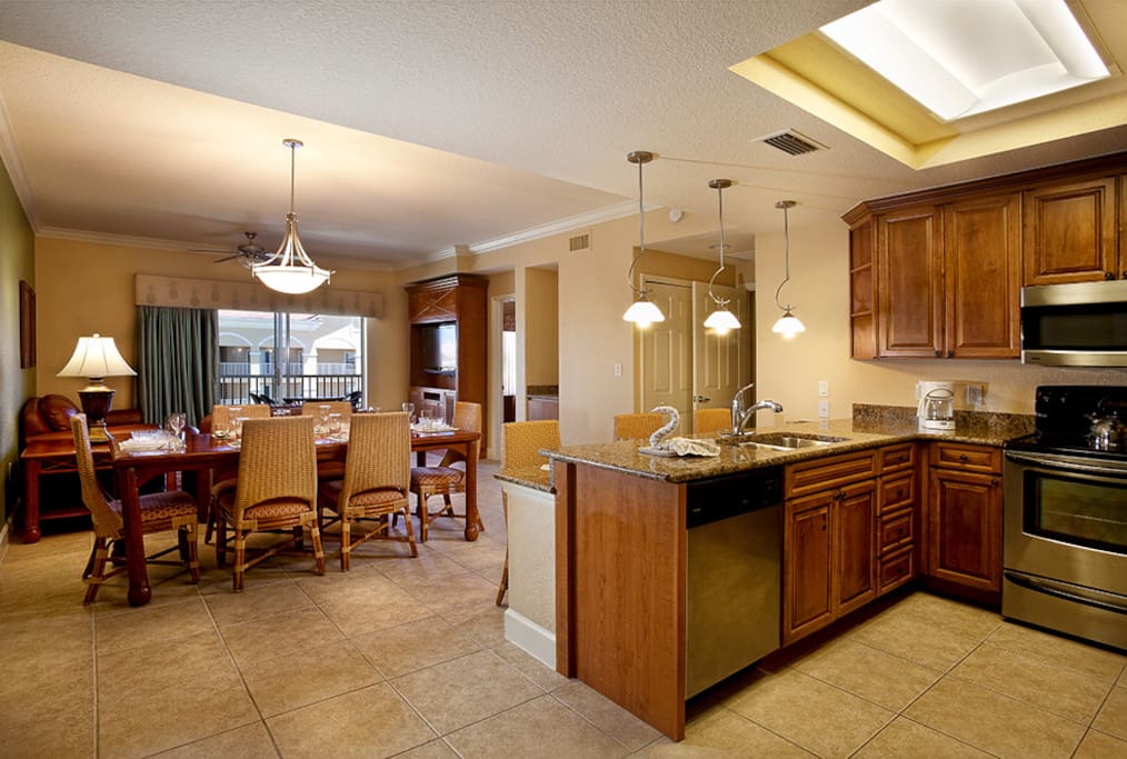 Family meals are easy with a fully equipped kitchen and spacious dining area.