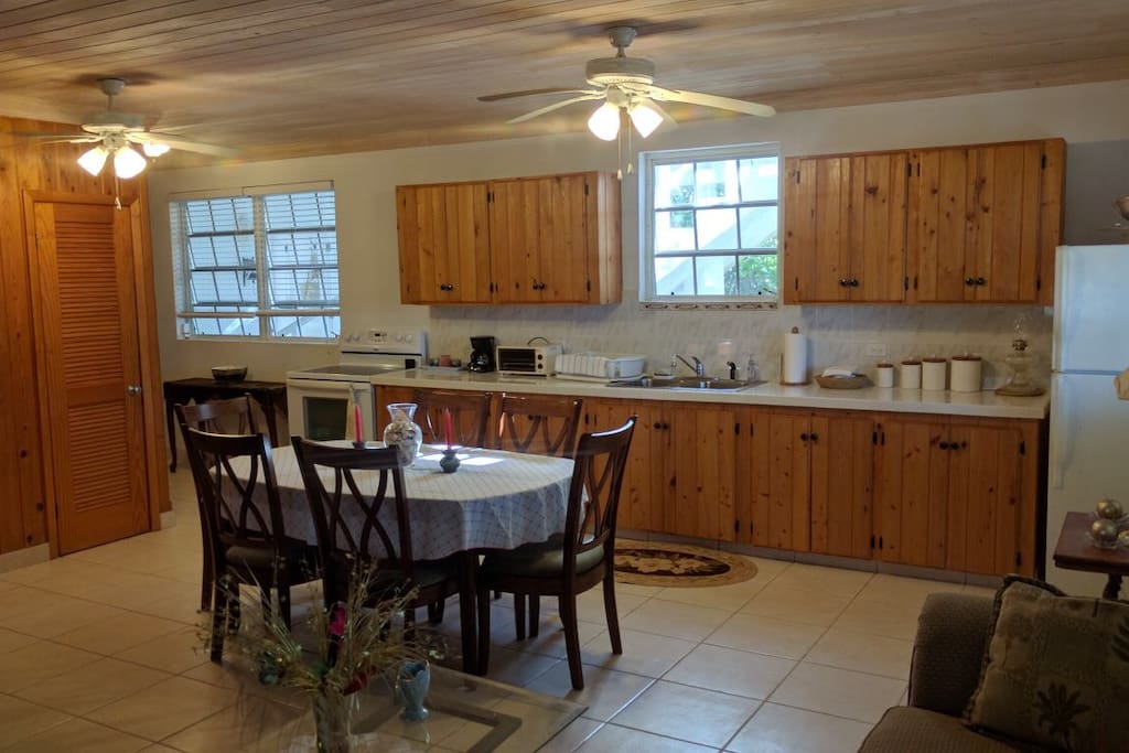 View from the living area of the kitchen and dining space.
