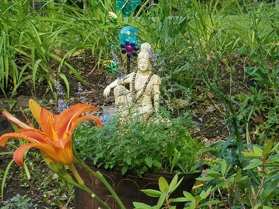 The Goddess Kuan Yin in our garden