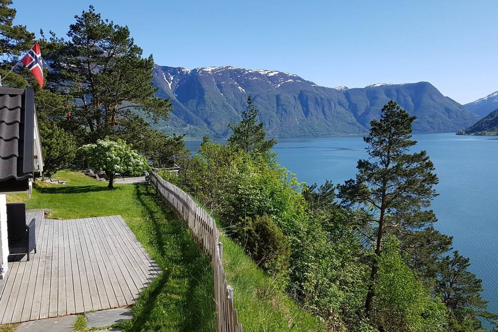 Terrasse in front of the private entrance. The lawn and terrasse in background also belongs to the apartment. May 2018.