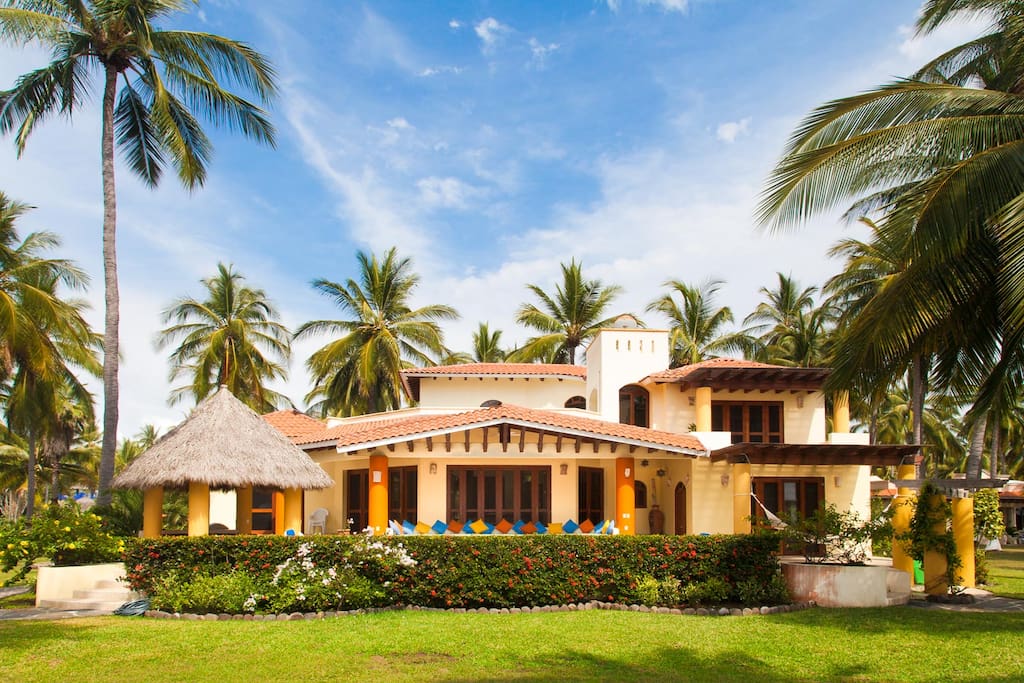 Tropical beachfront villa ready for your vacation