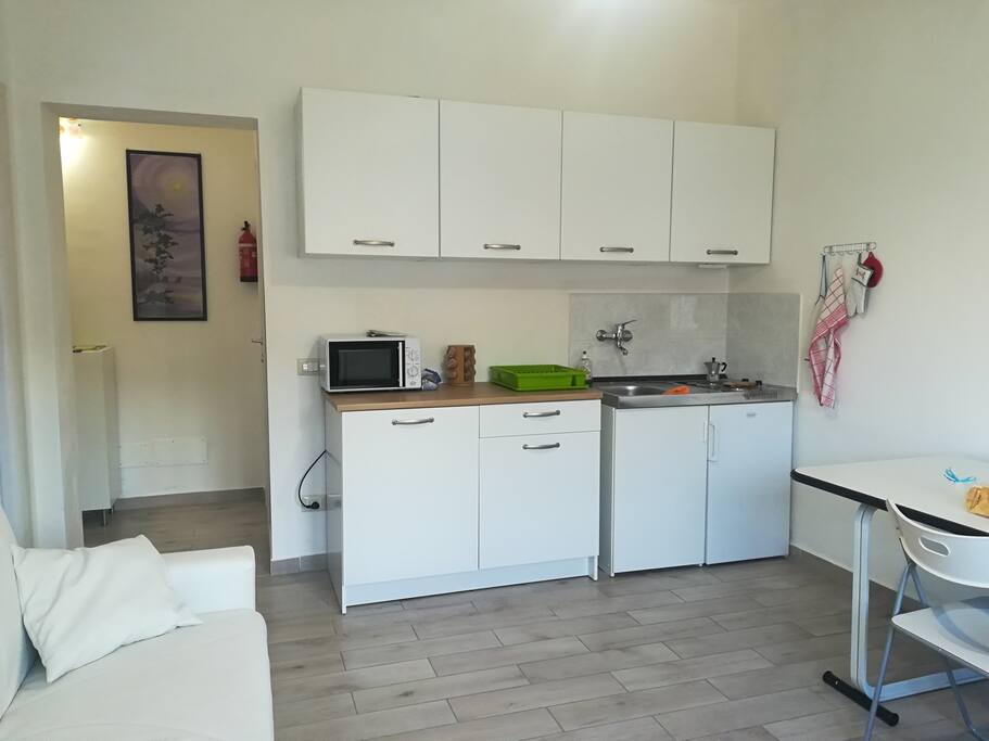 living room with kitchen / salotto-cucina
