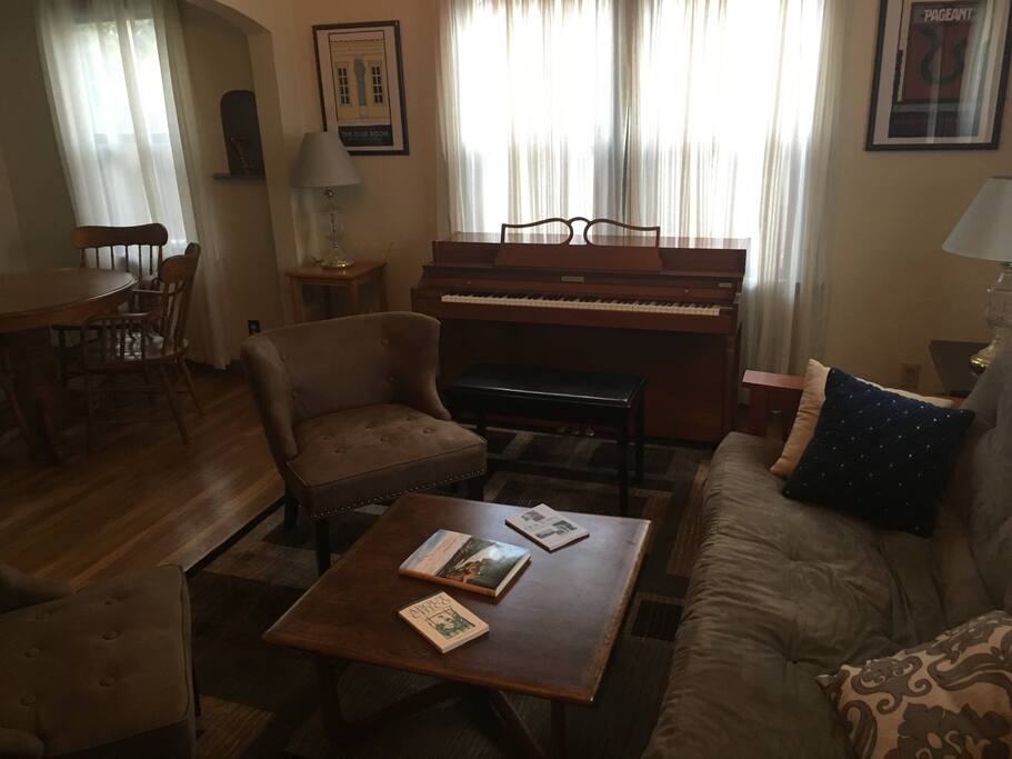 Futon sleeps two (piano bench seats two...)