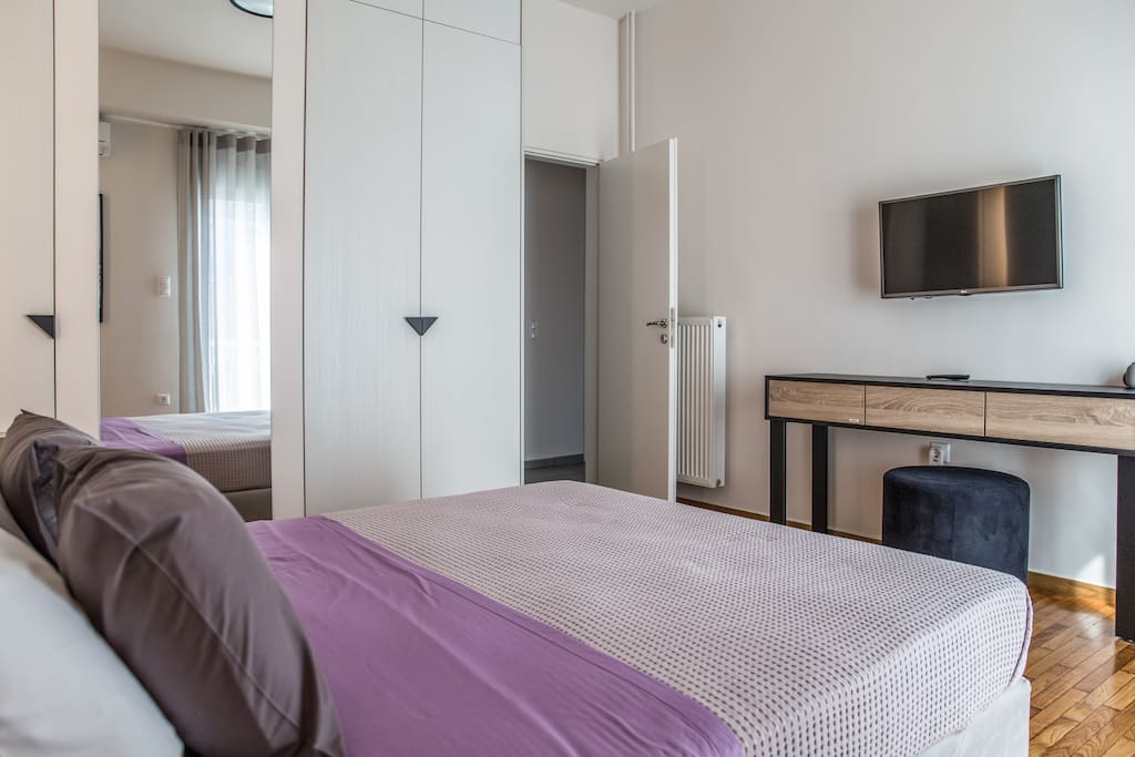 Bedroom with all comforts (spacious, closets, TV with Netflix, desk and full mirror)