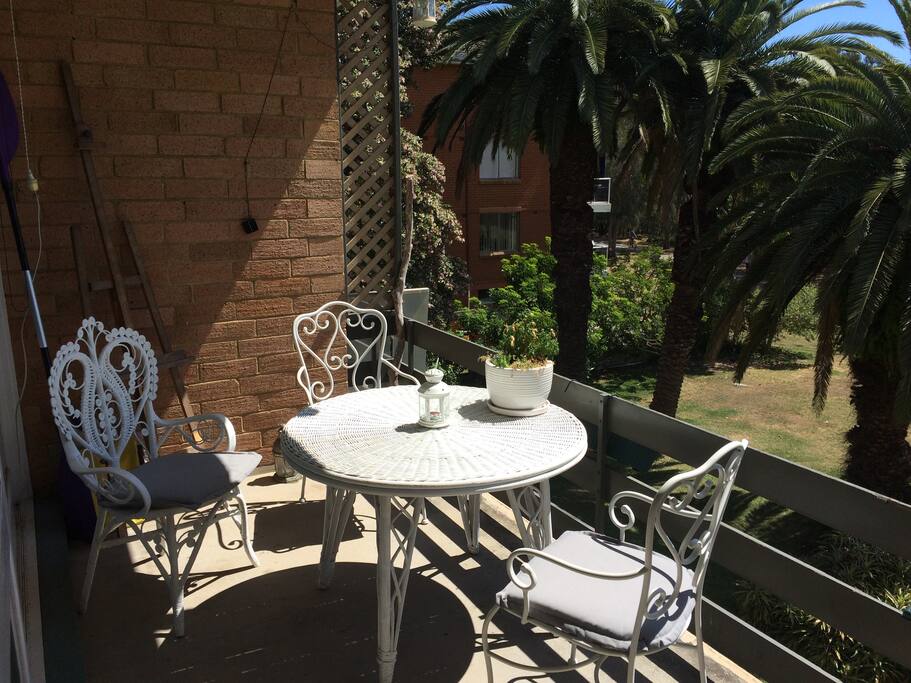 Balcony with comfy 3 piece setting & view of Narrabeen Lake.