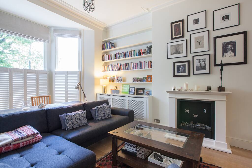 Large comfortable living room - high ceilings (3.5 meters), and a very comfortable sofa. Books in French, English and Dutch for you to borrow.