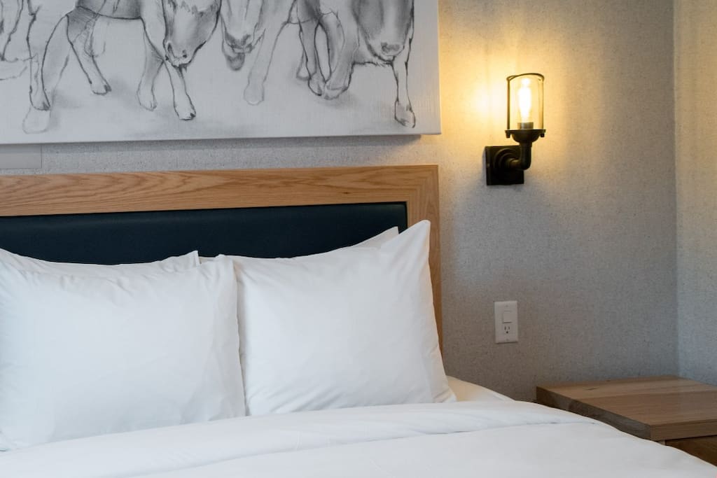 There is a luxurious queen-sized bed in our lovely studio condo.