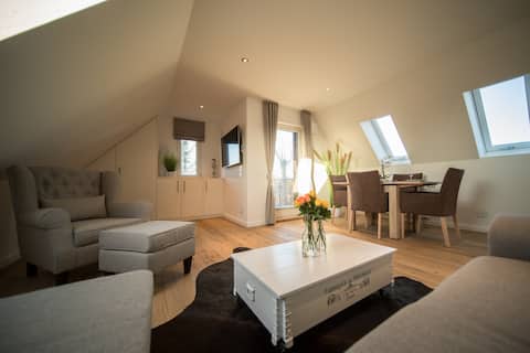 modern charming penthouse above the roofs of Sylt