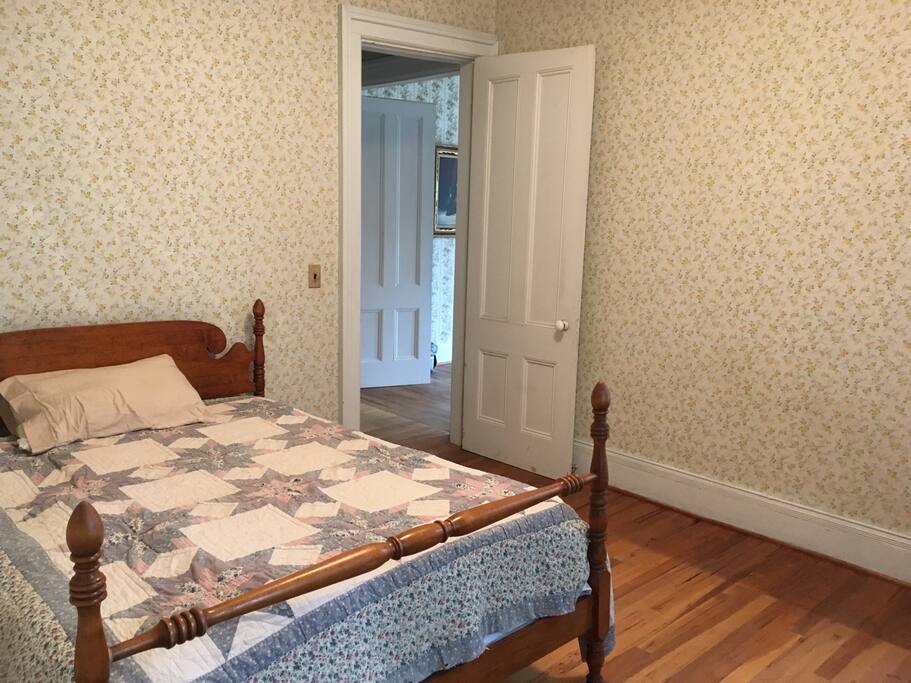 Full size bed, dresser and walk in closet with private attached bathroom in the downstairs bedroom.