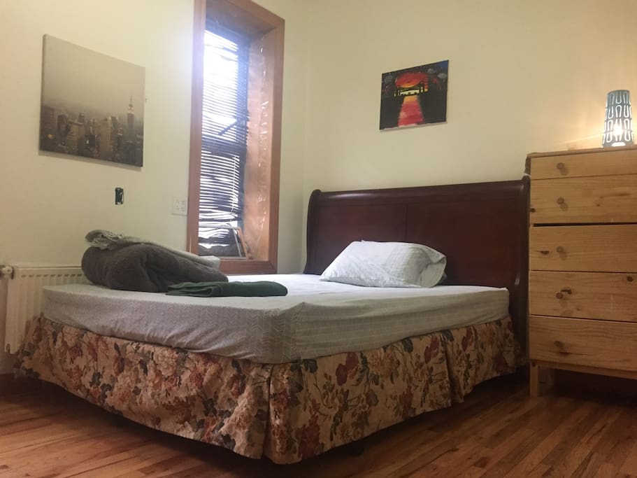 Queen size bed with a lot of space.