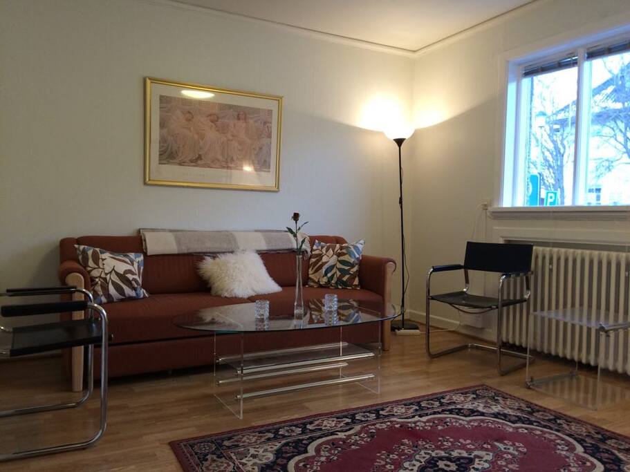 Living room with a street view.