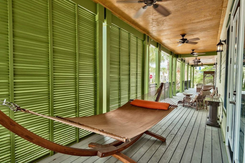 We bet you'll want to spend most of your time lounging on this front porch.