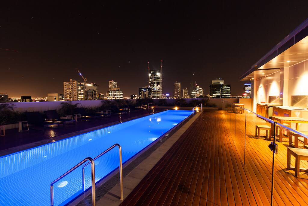 Night view of the Rooftop Pool
Swimming pool, patio and BBQ facility