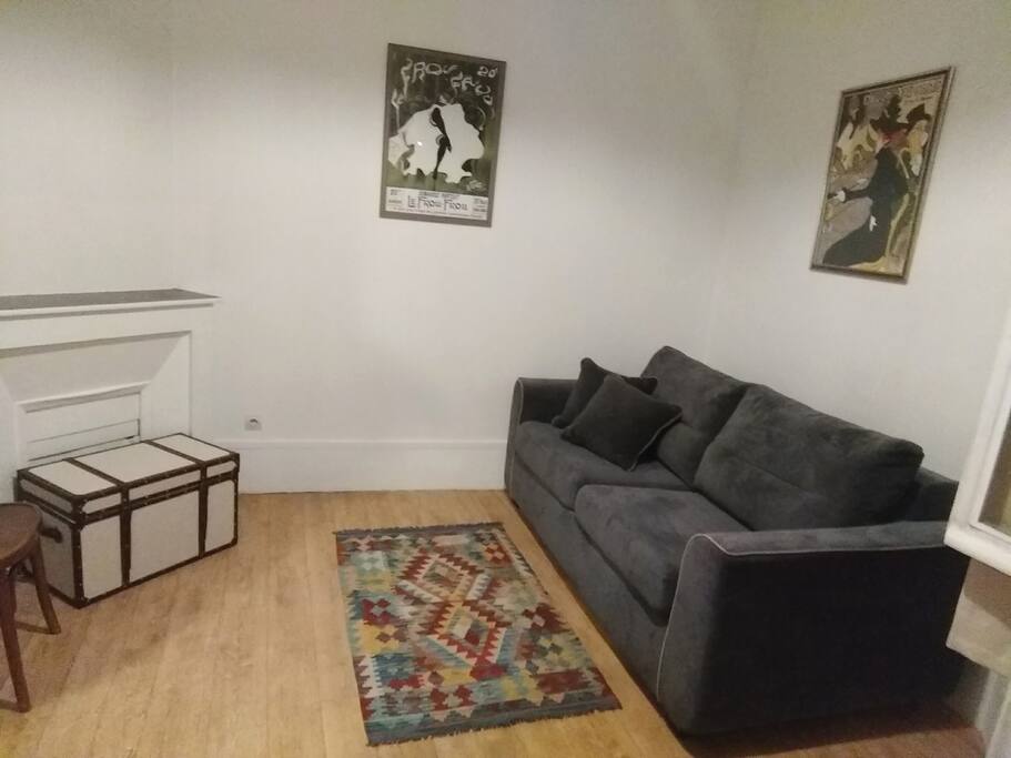 Ample couch during day...