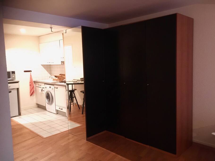 Large closet with view of the kitchen