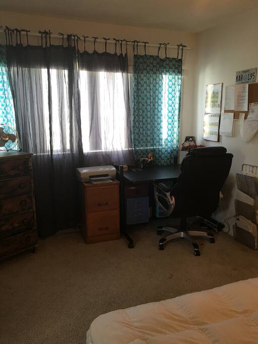big bedroom window and office space.