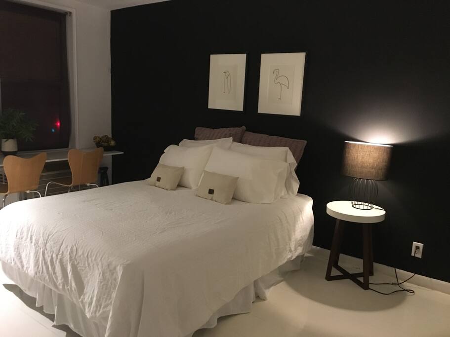 A Spacious Master Bedroom; a comfy queen size bed sleeps two guests.