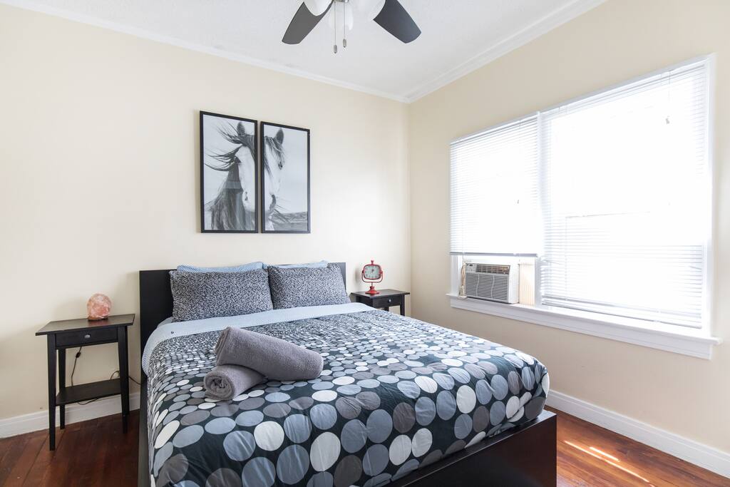 bed is queen size along with an extra single mattress with e metal frame