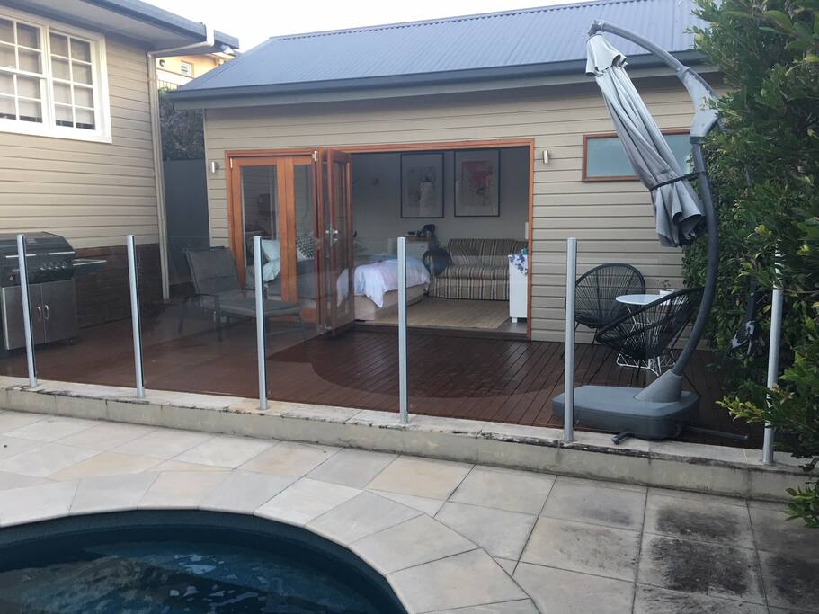 Outside view of pool house from pool
