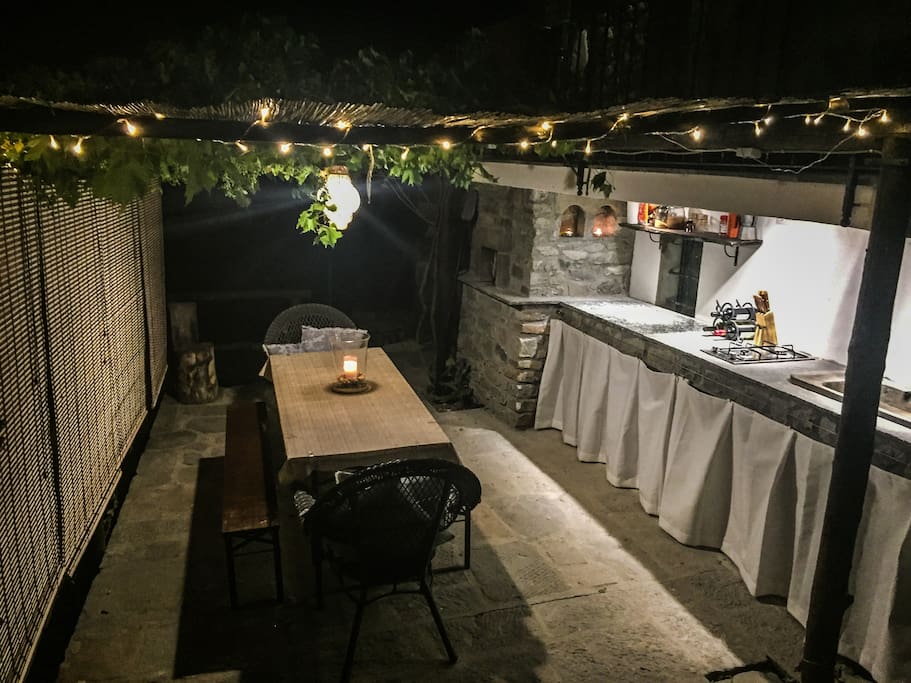 The outdoor dining and cooking area.