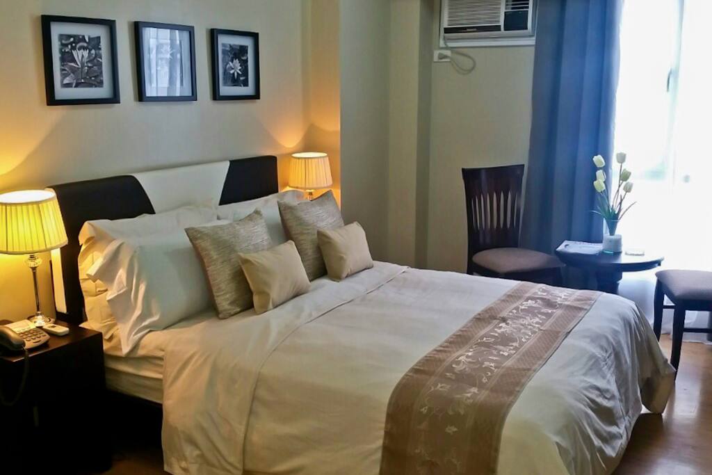 Bed with duvet and comfortable 12" mattress, coffee table set.