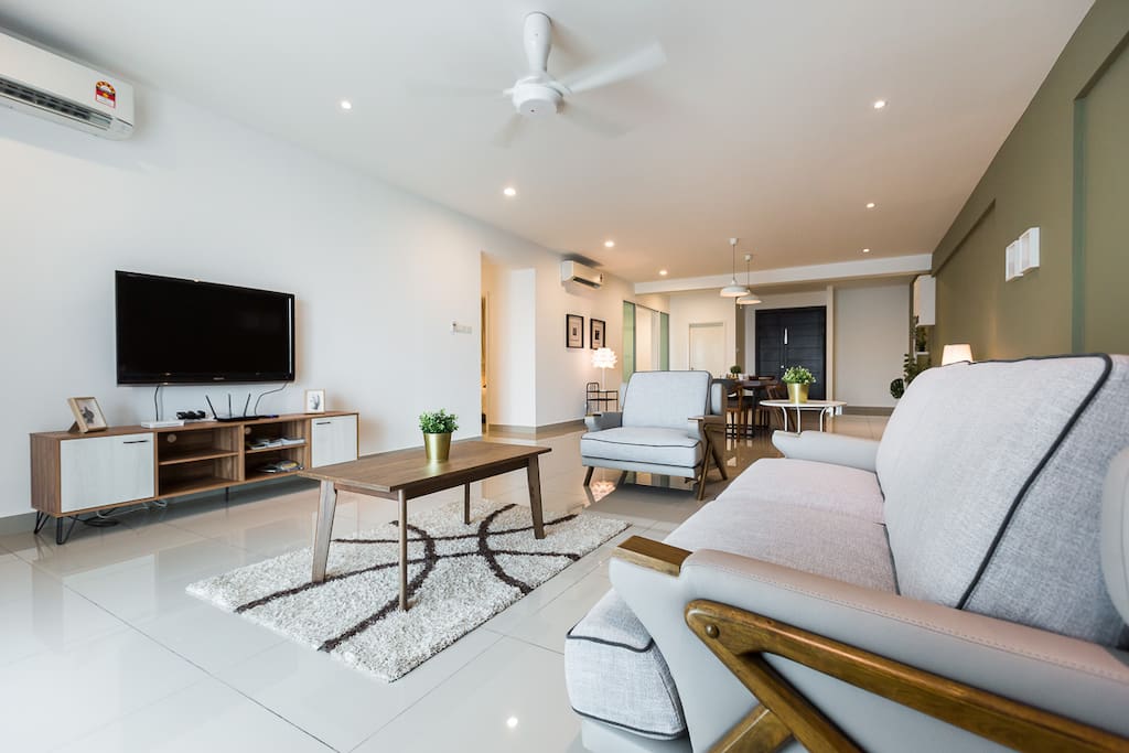 The spacious living area where you can enjoy the tv and watch the perfect seaview.