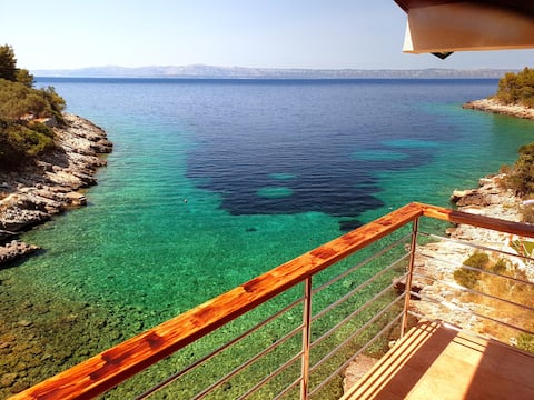 Remote beach house, just above the sea.