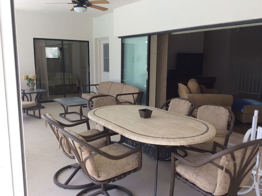 Enjoy meals on the roomy covered Lanai. Open the pocket sliding doors in the Great Room to bring the outside in & the inside out.