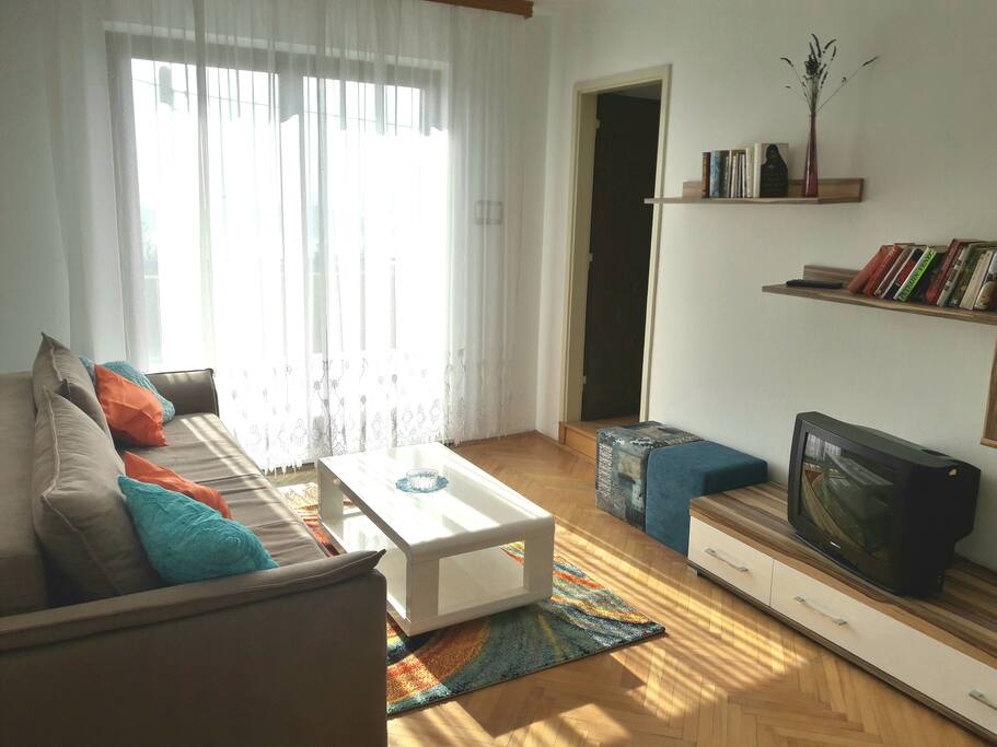Living room with sunny sea view terrace